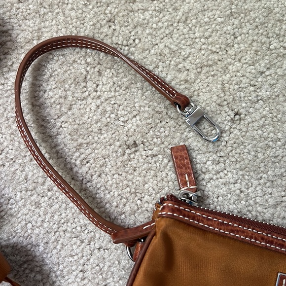 Tumi wristlet with crossbody strap. - Picture 3 of 8